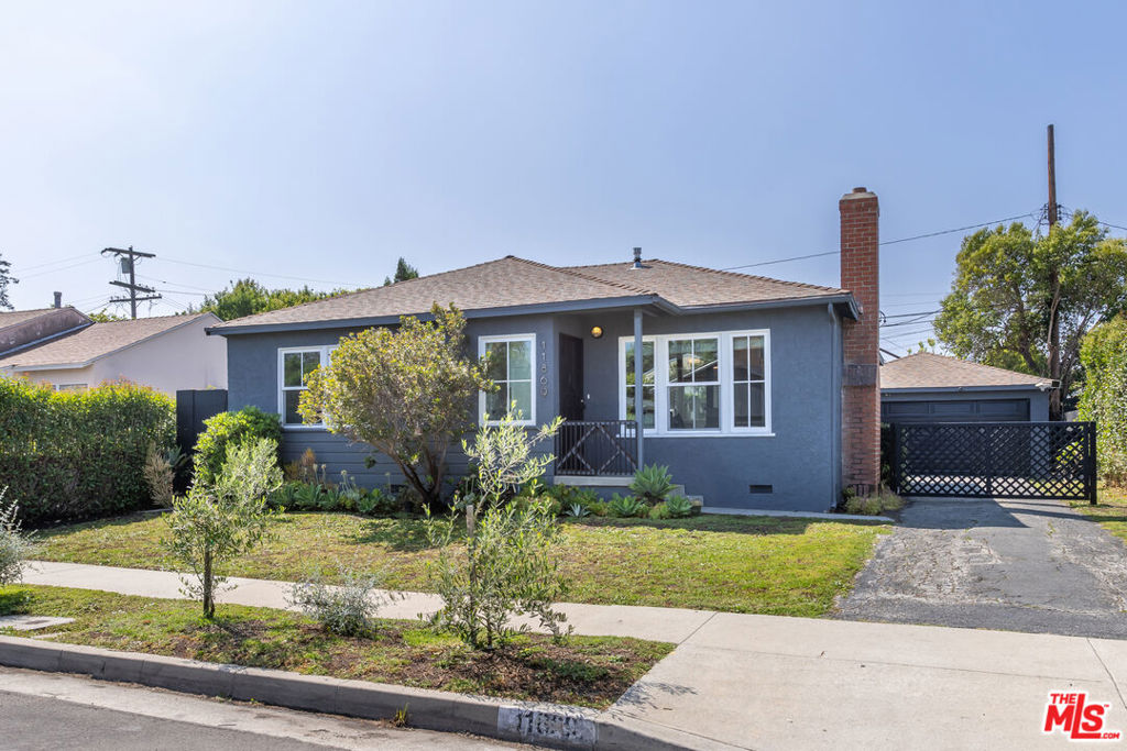Welcome to 11869 Weir St, located in a quiet neighborhood between Marina del Rey, Culver City, and Playa Vista. This home is a rare gem, offering easy access to lively neighborhoods while maintaining a peaceful residential atmosphere. This recently updated traditional home boasts two bedrooms and 1.5 baths on a quiet suburban street. Oversized windows in the living room fill the space with natural light, enhanced by its desirable southeastern exposure. It features a dining room and living room with a coveted wood-burning fireplace, central A/C, tankless water heater, laundry, a fully fenced-in outdoor entertaining area with lush landscaping, and an organically shaped gravel seating area. The backyard has multiple fruit trees, offering a serene outdoor space for relaxation and entertaining. Additionally, the home features a detached 2-car garage, offering secure parking and extra storage space. Don't miss the opportunity to make it yours and enjoy the best of Southern California living!