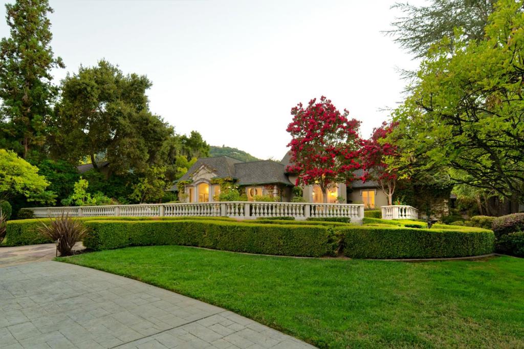 The epitome of luxury living at this stunning approximately 1-acre estate in Saratoga's finest neighborhood. This European-inspired residence offers resort-like amenities, including a US Open style tennis court, pebble-bottom pool, spa, and gourmet outdoor kitchen. The interior boasts high-end finishes, a private retreat, and half a mile to the renowned Montalvo Arts Center and nationally renowned Saratoga schools. Walk to Saratoga Village. Perfect for discerning buyers seeking sophistication and refinement in the heart of Silicon Valley.