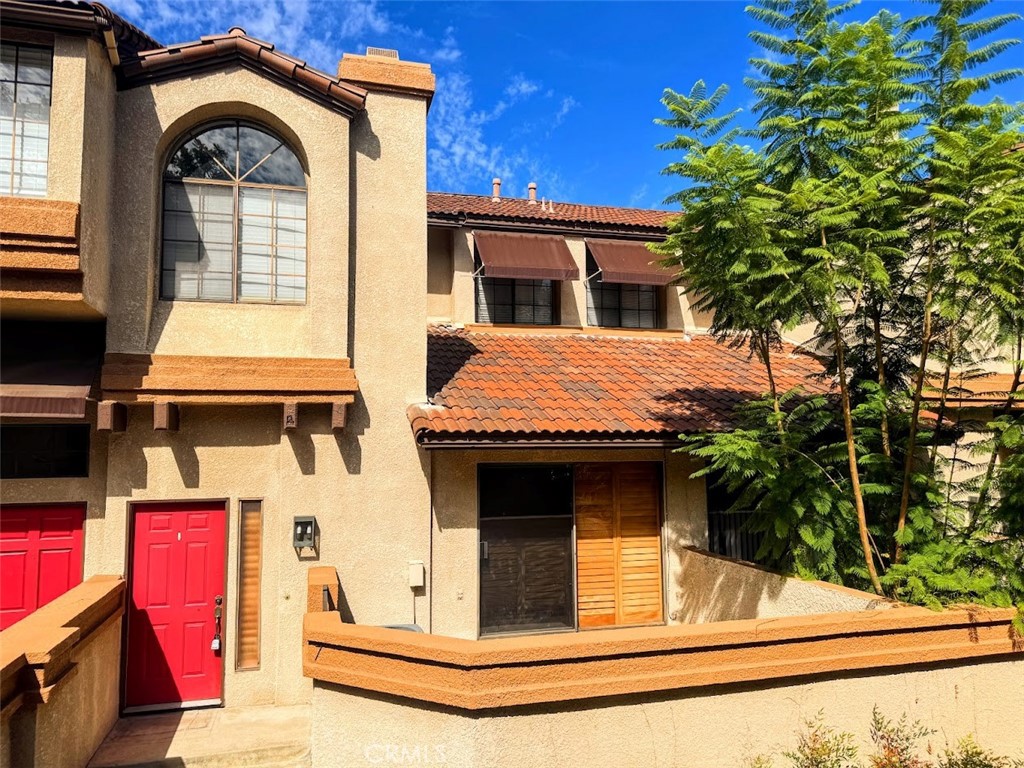 A highly decorative opportunity to further unveil a lovely two-story, 2 bedroom and 3 bath home located in the beautiful and well sought out Hidden Valley gated community. Take complete and utter delight with the laminate wood flooring present throughout the course of the home. It will boast with a nice sizable bedroom. The primary bedroom has a full bath. It beckons a formal living room with a warm fireplace, a formal dining room, and a private front yard with a sliding door covered by wood shutters for complete interior privacy. Not to mention that there is a nice patio adjacent to the kitchen. Marvel at the distinct decorative loft space appeal with a high ceiling bookshelf enriching that tranquil space. The main floor will also have direct access to the 2 car garage where you will conveniently find the washer and dryer hookup present. This location has impressive convenience. It is within walking distance to Diamond Ranch High School and has seamlessly easy access to the 60/71 freeway. This rental will not be on the market for long! DO NOT MISS OUT ON THIS PICTURE PERFECT OPPORTUNITY.
