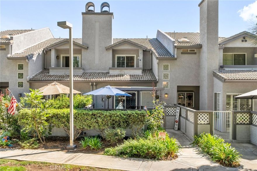 Welcome to this charming home in the desirable Vintage Townhome community, offering comfort, convenience, and great amenities! The community features a gated pool and spa, perfect for relaxing weekends or sunny afternoons.



Enjoy the inviting covered front porch and beautifully maintained grounds—the HOA takes care of all exterior landscaping, so you can simply enjoy your surroundings. Inside, the home features laminate flooring, a spacious family room with a fireplace and dry bar, and a cozy breakfast nook that opens to the galley-style kitchen. A powder bath on the main floor adds convenience for guests.



Upstairs, the primary bedroom offers sliding doors to a private balcony, plus a primary bathroom with dual sinks and a walk-in shower. Another bedroom with its own en suite bathroom provides flexibility for guests or a home office.



Additional highlights include a one-car garage and access to the community clubhouse, pool and spa, all within a peaceful and well-kept gated setting.