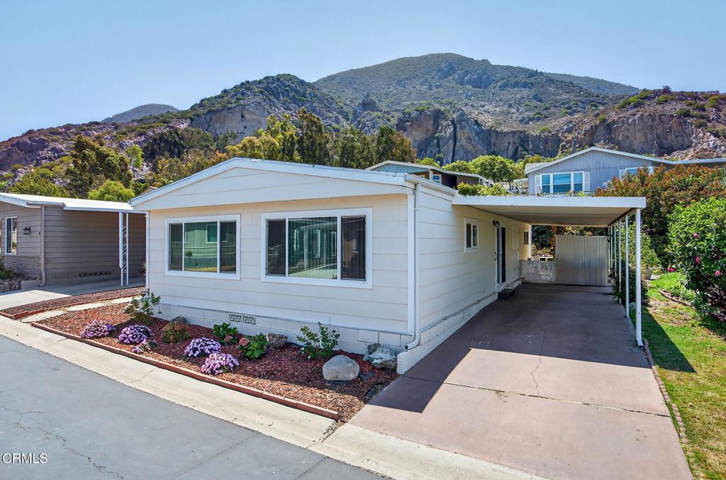 Welcome to Camarillo Springs and an incredible opportunity in the popular 55+ gated community, nestled against the Camarillo hills. This value-priced home offers approx. 1,256 sq. ft. with 2 bedrooms and 2 baths, featuring an open kitchen, dining area, and a spacious living room that flows to a large screened-in porch--perfect for morning coffee or evening breezes. Thoughtful touches include updated bathrooms, dual-pane windows and slider, a covered carport for two cars, and two storage sheds. Best of all, this is not leased land--you own both the land and the home. Enjoy resort-style amenities: pool, spa, clubhouse, exercise room, and bocce ball court. HOA includes basic cable and sewer. All of this just moments from Camarillo Springs Golf Course, with easy access to shopping and dining via the 101 freeway. A fantastic chance to make this friendly, well-kept community your next home.
