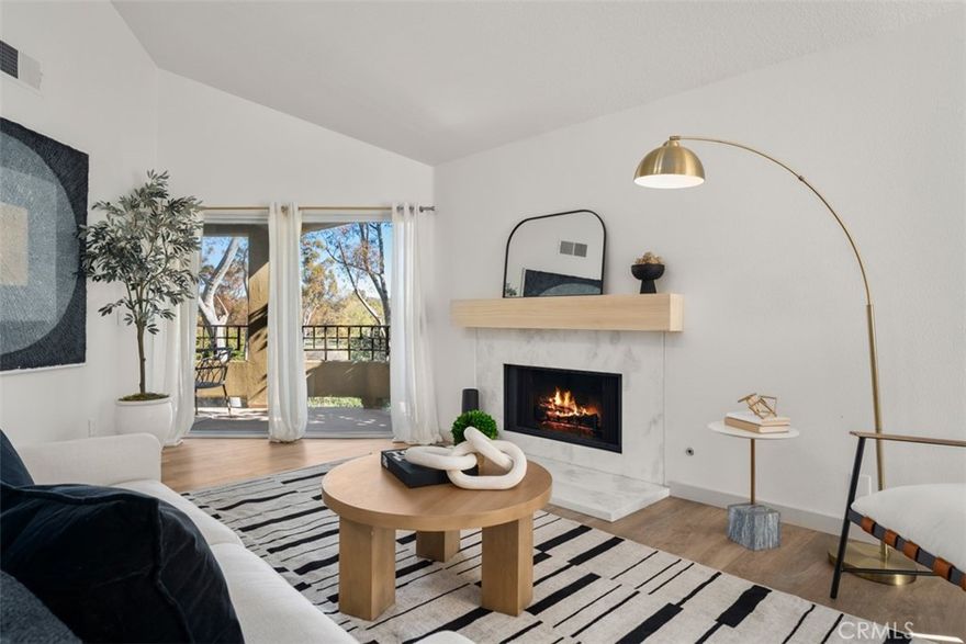 Welcome to this beautifully remodeled 2-bed, 2-bath home with an expansive bonus loft, offering over 1,600 sq. ft. of light-filled living in the heart of Irvine. Thoughtfully upgraded throughout, the home features luxury vinyl plank flooring, refaced cabinetry, new designer fixtures, and custom closets that elevate everyday living.

The kitchen boasts stainless-steel appliances and opens seamlessly into the dining and living areas, creating an inviting space for both entertaining and relaxation. Vaulted ceilings draw the eye upward toward the impressive loft—ideal for a home office, media room, or guest retreat. The home includes a separate laundry room and storage area, keeping chores streamlined and out of sight. There is also an attached one-car garage and a separate one-car garage.

Enjoy tranquil views of the Mason Regional Park from the large balcony, just moments from your doorstep. With its unbeatable location, you can easily walk to UCI, biking paths, and the shops and restaurants at University Town Center. This move-in-ready home blends modern comfort with the best of Irvine. Offering a lifestyle that’s both effortless and convenient.