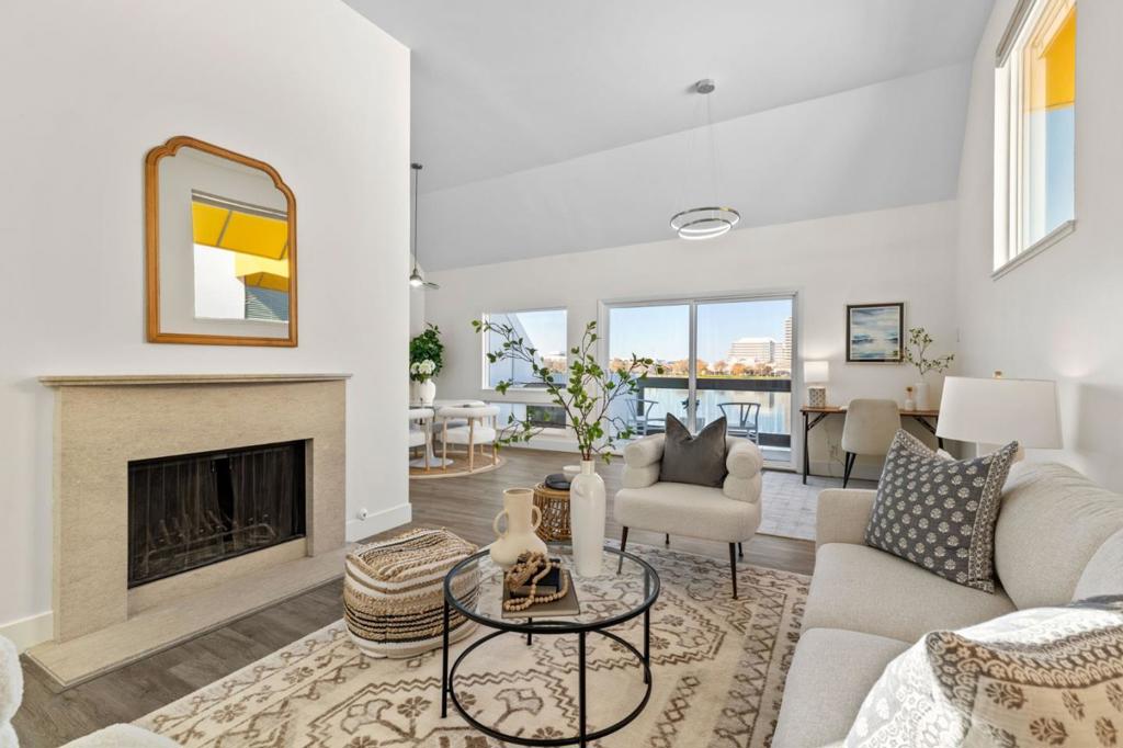 MOVE IN READY & WAKE UP to serenity at 614 Portofino's top floor breathtaking WIDE-WATER & SUNSET VIEWS. Upgraded unit with freshly painted interior, exterior & new appliances. This end unit floor plan features 2 spacious bedrooms and 2 bathrooms floor plan with HIGH CEILINGS, large windows, skylights, spacious living room/office with fireplace & open concept to the patio to enjoy the view. This spacious condo also includes a laundry room & one-car garage with storage. Centrally located in highly sought after Islands community of Foster City, community a pool and spa and clubhouse, plus extensive water views and trails. HOA includes beautiful roads, community grounds, utilities and MORE! Foster City is centrally located to San Francisco, SFO Airport and Silicon Valley and has a unique architecture and bridges crossing over the man-made lagoons. With 223 acres of waterways, shoreline and residential islands. Foster City is known for recreational opportunities such as canoeing, paddle boating, electric boat rentals and windsurfing.
