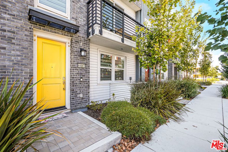 Welcome to this stunning NORTH-East facing Toll Brothers townhouse on a premium lot in the desirable Metro West community. Built just two years ago, this modern 4-bed, 3.5-bath home spans approximately 2,112 sq ft and is filled with natural light, elegant finishes, and two private balconies. The residence showcases numerous builder upgrades, including LVP flooring, upgraded kitchen cabinets, designer backsplash, pendant lighting over the island, recessed lighting throughout, two-tone interior paint, Num Lock entry doors with chrome handles, two electric bidets, water softener loop upgrade, HDMI flat-screen pre-wiring, and pre-wired Level 2 EV charging. The first floor offers an en-suite bedroom and full bathroom ideal for guests or a private office. The second floor features an open-concept living area perfect for entertaining, while the upper level includes a spacious primary suite with walk-in closet and spa-like bathroom, plus two additional bedrooms and laundry. Conveniently located near Warm Springs BART, Lila Bringhurst Elementary, major highways, restaurants, and shopping, this home delivers luxury and lifestyle in one of Fremont's most sought-after communities. Don's miss the chance to make this your dream home.