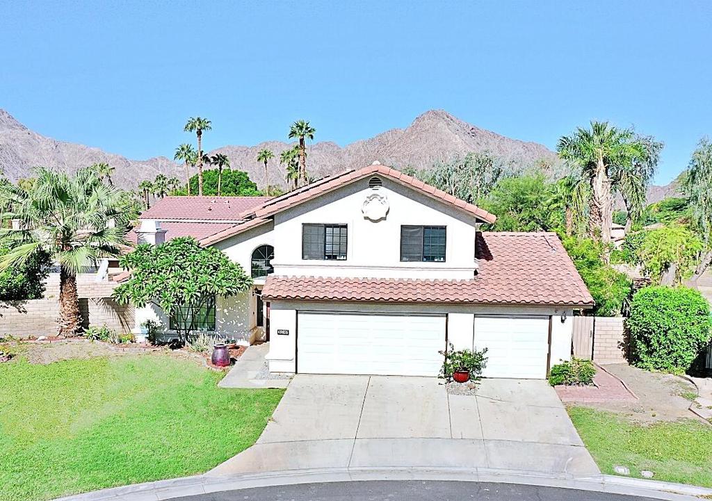 Welcome to your dream home in the heart of La Quinta, the internationally renowned Jewel of the Desert!. This stunning two-story residence combines style, comfort, and location, offering the perfect desert retreat or full-time residence for retirees, as well as a family with school age children, as the schools are nearby. Featuring 4 spacious bedrooms, 3 beautifully remodeled bathrooms, and a 3-car spacious garage, this home is designed for both relaxation and entertainment. Step inside and you'll be greeted by a bright open floor plan with with cathedral ceilings, elegant travertine and bamboo laminate floors flowing throughout, and don't overlook the stunning specially treated custom staircase. The remodeled kitchen boasts modern finishes, plenty of cabinetry, subzero frig and premium appliances--ideal for the home chef and perfect for hosting family and friends. The kitchen opens up to the family room entertainment area. Unwind in your private backyard oasis, complete with a sparkling pool and spa on a generously sized lot with plenty of room for a day full of fun with friends and family. Whether you're lounging poolside sipping on a glass of your favorite wine, enjoying an evening under the stars, or entertaining guests, this outdoor space is made for creating unforgettable memories.The location is second to none: just minutes from world-class PGA Style golf courses, The world renown Indian Wells Tennis Garden--home of the BNP Paribas Open, and only 7 minutes from the legendary Coachella Music Festival grounds. Shopping, dining, hiking, and luxury resorts are all within easy reach, making this home as convenient as it is desirable.Every detail has been thoughtfully upgraded to blend modern convenience with timeless charm, ensuring a move-in-ready experience. Whether you're seeking a vacation home, investment property, or your forever residence, this La Quinta gem checks all the boxes.Don't miss your chance to own a piece of paradise in one of the most sought-after desert destinations where the Presidents and Celebrities come to play. Don't miss out on this fantastic opportunity, schedule your private showing today and step into the lifestyle you've been dreaming of!