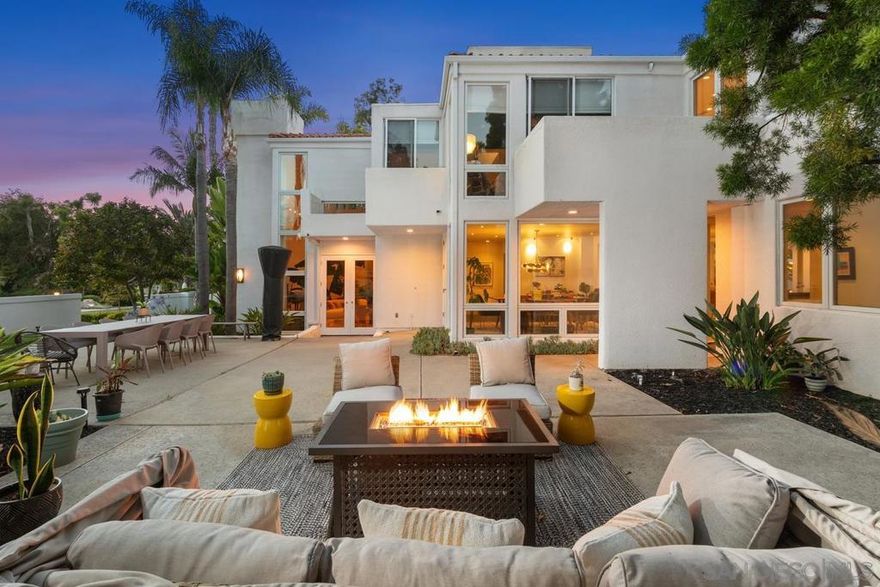 Great PRICE for Great Location in Fairbanks Ranch! Work completed! Hollywood glam meets Art Deco Miami in this showstopping Fairbanks Ranch estate—where bold design and timeless Southern California elegance create an effortlessly luxurious lifestyle. The thoughtfully designed floor plan offers four spacious secondary bedrooms on the main level, while the entire upstairs is dedicated to a private primary suite complete with a serene sitting room and executive-style office. Recently renovated with exquisite designer flair, the home features a curated mix of high-end materials, including rich Maple wood floors, sleek black porcelain tile, quartzite countertops, and stunning custom cabinetry throughout. Sunlight pours through expansive windows, illuminating statement art walls commissioned by a renowned artist and enhancing the home’s vibrant, gallery-like atmosphere. Multiple indoor/outdoor living spaces invite year-round entertaining, alongside a regulation tennis court, resort-style pool and spa, croquet lawn, and a detached guest house—set on a premier corner lot on the coveted North side of Fairbanks Ranch. Just moments from the lake, clubhouse, and scenic walking trails, and with quick access to the residents-only gate, this exceptional estate offers privacy, prestige, and polished California living at its finest.