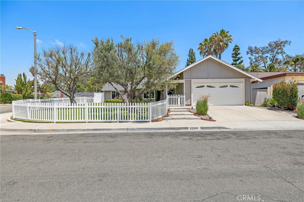 Welcome to this beautiful, single level, upgraded, and pristine Gem in the Family community of Laguna Terrace, in Laguna Hills. Talk about curb appeal! The property sits on a 6,600 corner lot, with a beautifully manicured front yard, a new white picket fence, and a fully covered front entrance. The property features over $145K of new upgrades! It boasts 2 master bedrooms, 3 additional bedrooms, 3 remodeled bathrooms, vaulted ceilings, a newer kitchen, new recessed lighting, new closet & bedroom doors, and bathroom vents. Additional upgrades include a new roof, re-piped in the last few years, electrical panel, thermostat, ceiling fans, garbage disposal, dual pane windows throughout, French doors, EV charger, and a sprinkler system. The backyard is beautifully maintained, spacious, and features a firepit, perfect for entertaining. Located in the most central part of Laguna Hills. The property is minutes away from the beach, 405, 5 and 133 Freeways. Close to great shopping, restaurants, entertainment, parks, tennis courts, and greenbelts, to enjoy walks and bicycling. NO HOA's or Mello ROOS. This beauty will not last long!