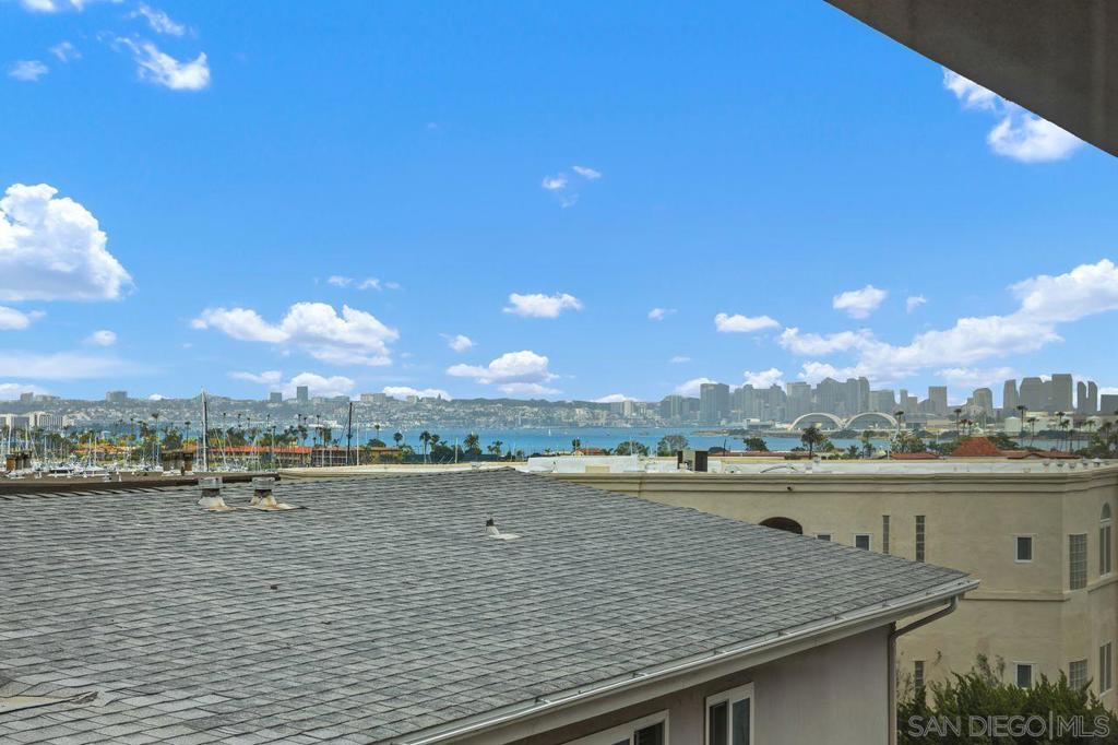 Welcome to a wonderful, single level condo located in the heart of the desirable neighborhood of La Playa in Point Loma. This top floor, corner unit offers views of the San Diego Harbor, the downtown skyline and Shelter Island. Enjoy water views from the balcony, living room and from both bedrooms. The kitchen is complete with granite counters, a walk-in pantry and opens to a dining area with a skylight. The spacious living room has a fireplace and a built in wet bar. Perfect for relaxing or entertaining. Features include newer windows with wood shutters, ample storage throughout, an in-unit laundry room and AC. The secured parking garage includes one dedicated parking spot with a metered outlet for EV charging and a storage closet, plus access to the community gym and sauna. Here is your opportunity to live in this fantastic coastal community just one block from Kellogg Beach, with close proximity to Yacht Clubs, the La Playa Trail and the shops and restaurants of Point Loma Village and Shelter Island.