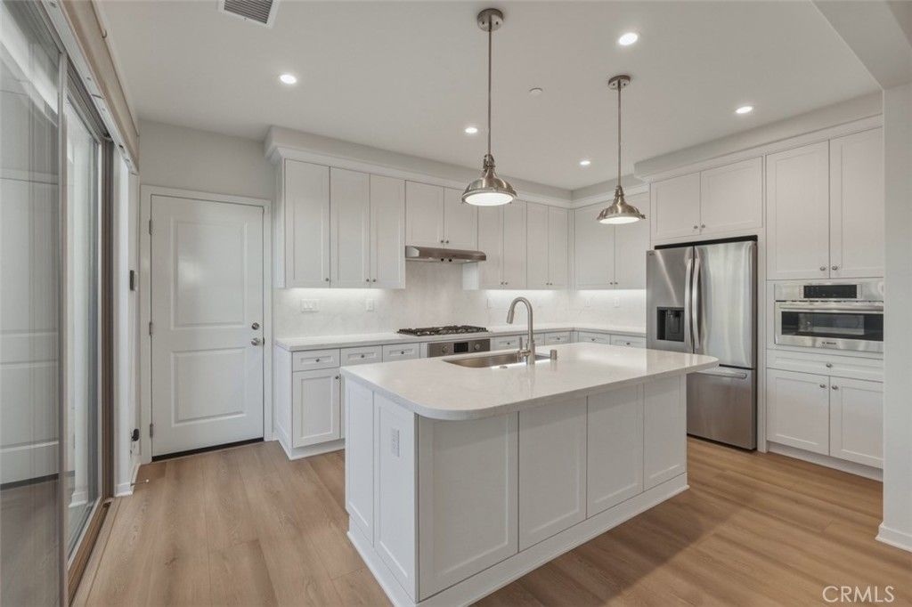 Photo of 128 Newburry, Irvine, CA 92618 (MLS # OC26111085)