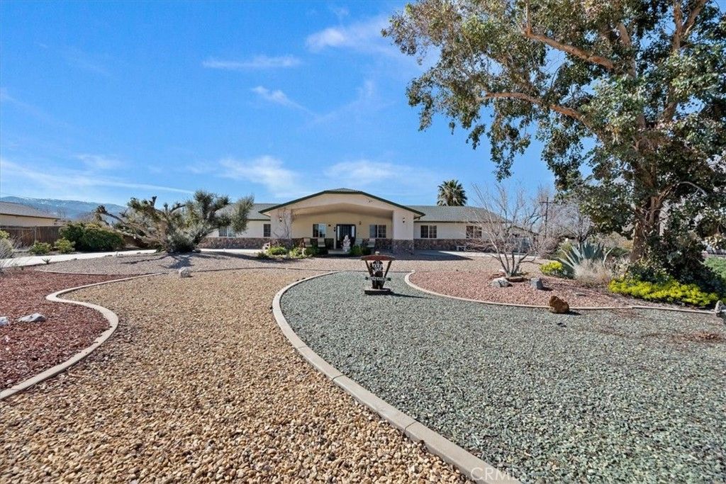 Photo of 9860 Alta Mesa Avenue, Phelan, CA 92371 (MLS # IV26043802)