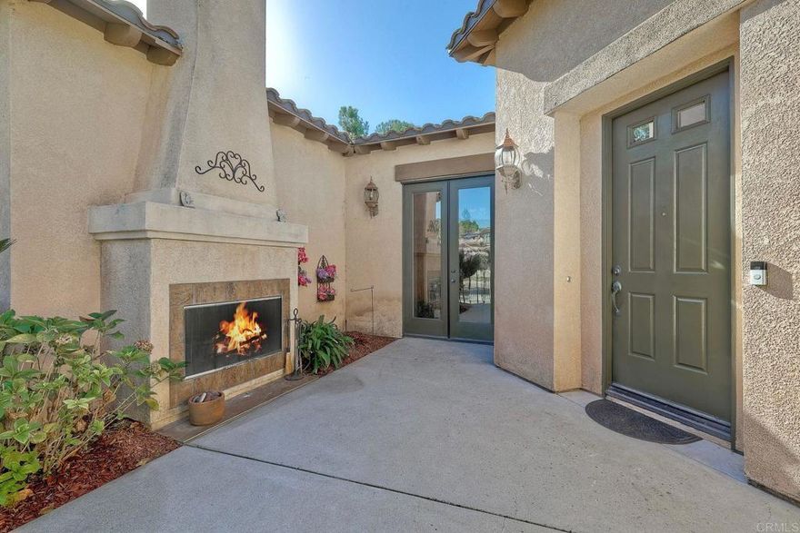 Welcome to this unique Hidden Trails community single-story Estate home. Beautiful sunsets and views!  Front court yard has an outdoor fireplace.  Enjoy the gorgeous sunsets while in the pool, spa or relaxing in the private yard.   Inside you'll enter into a rotunda that will lead you to find high ceilings and wide hallways.  Home has OWNED SOLAR with two Tesla Batteries.  Home has an open floor concept. Welcoming eat-in kitchen and formal dining room.     Outdoor BBQ area with refrigerator. Walk in Pantry.  Primary bedroom has separate vanities, shower and soaking tub, enter through the door to a HUGE closet.  Low HOA. Don’t miss this one!