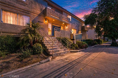 Photo of 18347 Saticoy St #24, Reseda, CA 91335 (MLS # SR26086158)