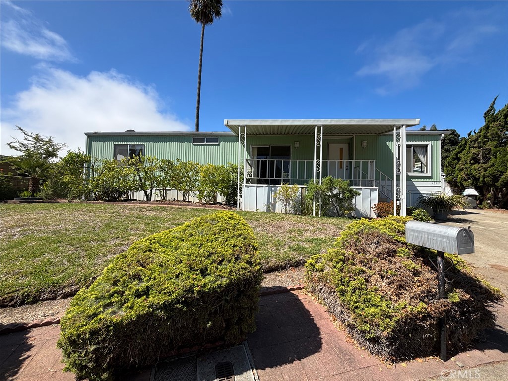 Located in the desirable Folkert Oaks Community in beautiful Nipomo, this manufactured home is unique because it sits on its own lot with a permanent foundation – no HOA fees or space rent. Enjoy the outdoors from the front and back decks, which offer views of the foothills, and the backyard has a private gate. The beautifully landscaped backyard features mature, low-maintenance plants, a covered patio, and sheds for ample storage. Inside, the home you will find a formal living room, a well-appointed dining room with a built-in hutch, and a spacious family room that enhances your living experience. The bright, open kitchen is designed for convenience with a breakfast bar. Indoor laundry area. The main bedroom serves as a true retreat, complete with its own bathroom that features a large soaking tub. Situated on a cul-de-sac, this home includes a convenient two-car detached garage with a long driveway providing plenty of parking. Its prime location near shopping and restaurants, with easy access to the highway, presents a fantastic opportunity. With a bit of vision and some modern updates, it can easily be transformed into your perfect home. Don’t miss out on this exceptional property!