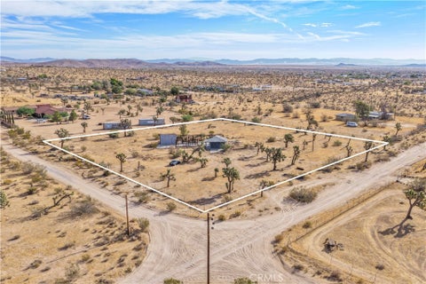 Photo of 58824 Mesa Dr DR, Yucca Valley, CA 92284 (MLS # CV26179175)