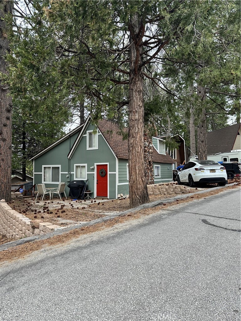 Fully Furnished & Fully Remodeled Gem in Downtown Running Springs Welcome to your dream mountain retreat! This beautifully fully furnished home has been completely remodeled by the current owner to offer a sleek, modern living experience with countless upgrades throughout. Prime Location: Nestled in the heart of Downtown Running Springs, this home is within walking distance to everything you need—parks, the post office, local markets, a cozy coffee shop, and a selection of great restaurants. Plus, you're perfectly situated between Lake Arrowhead and Big Bear Lake, offering easy access to year-round outdoor adventures like boating, horseback riding, hiking, swimming, skiing, and fishing. Interior Highlights: Downstairs: Two spacious bedrooms and two full bathrooms, thoughtfully designed for comfort and style. Upstairs: One bedroom with a half bathroom, plus a versatile loft that can serve as an additional bedroom or a family room. Kitchen: The kitchen has undergone a stunning makeover, featuring modern finishes and a layout perfect for cooking and entertaining. Bathrooms & Flooring: No detail was spared—each bathroom was meticulously redone, and all flooring has been upgraded for a cohesive, high-end look. Bonus Perks: Enjoy your morning coffee with just a 2-minute walk to a charming local café. Grab your mail just two blocks away. Spend the day at the local park, located right behind the home—an ideal spot for picnics, play, or peaceful relaxation. Whether you're looking for a full-time residence, vacation home, or a rental investment, this property checks all the boxes. Don't miss out on owning a slice of mountain paradise with modern flair! 1st Floor. 2 bedrooms with One full size bed & 2nd bedroom Full + Twin Bed 2nd Foor: 2ND FLOOR: 1 bedroom with 1/2 bathroom plus a loft. total queen bed plus 4-twin beds on loft but can be removed if not needed.