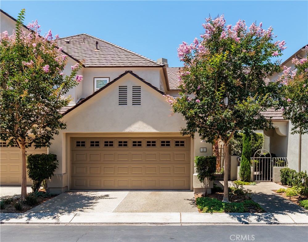 HERE IT IS! Welcome to this stunning 3-bedroom, 3-bathroom townhome located on a quiet cul-de-sac in the prestigious Turtle Rock Summit Towne Collection. Light-filled and thoughtfully upgraded, this home blends timeless comfort with modern style. A private courtyard entry leads into a dramatic living room with soaring ceilings and an adjacent dining area—perfect for both everyday living and entertaining. The beautifully updated kitchen features upgraded countertops, and a designer tile backsplash, along with a brand new 6-burner gas cooktop and wine cooler (to be installed prior to closing)—a dream setup for any home chef. The main level includes a highly sought-after MAIN FLOOR bedroom and full bathroom, ideal for guests or a home office. Upstairs, you’ll find two spacious ensuite bedrooms and a dedicated laundry room. The primary suite boasts high ceilings, a private balcony with peaceful treetop views, and a spa-like bath retreat. Recent updates include luxury vinyl plank flooring on the main level, new baseboards, custom interior doors and casing, new carpet on the stairs and upstairs bedrooms, and custom tile flooring in the upstairs bathrooms and laundry room. A private rear patio and attached two-car garage complete the package. Enjoy resort-style amenities in this beautifully maintained community, including a pool, spa, guest parking, and lush, park-like surroundings. All conveniently located near UCI, University High, Fashion Island, and Orange County’s stunning beaches.