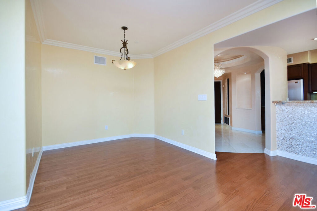 ***LOCATION, LOCATION, LOCATION*** 2 BEDROOM PLUS +++ DEN or 3rd BEDROOM!!!! Stylish and sophisticated open and light, this condo is located on a quiet walk street in prime Brentwood. Spacious living room w/crown moldings is open to the kitchen with Viking appliances, wine fridge and breakfast bar that lends itself to entertaining large groups. The den w/gas fireplace leads to a balcony perfect for outdoor living in California. Venetian plaster on many of the walls including the luxurious bathrooms. Owner requires a 13 month lease. Primary bedroom with balcony, walk in closet and luxurious bath. Private garage with side by side assigned parking spaces. Walking distance to all of the very best that Brentwood has to offer.