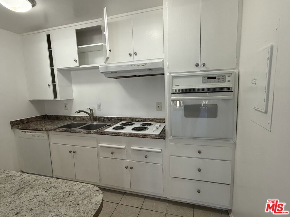 Large 2BR 2BA townhouse style apartment in prime North Hollywood. Right off Lankershim and Vineland, this unit is centrally located near major freeways and public transportation. 2 bedrooms upstairs with a full bathroom including a double vanity. Wall AC units in each Bedroom. Living room and kitchen downstairs with wall AC unit and private balcony. Dedicated carport below the unit with stars leading up to the entry. Private Laundry machines. Pets allowed with owners approval and pet rent.