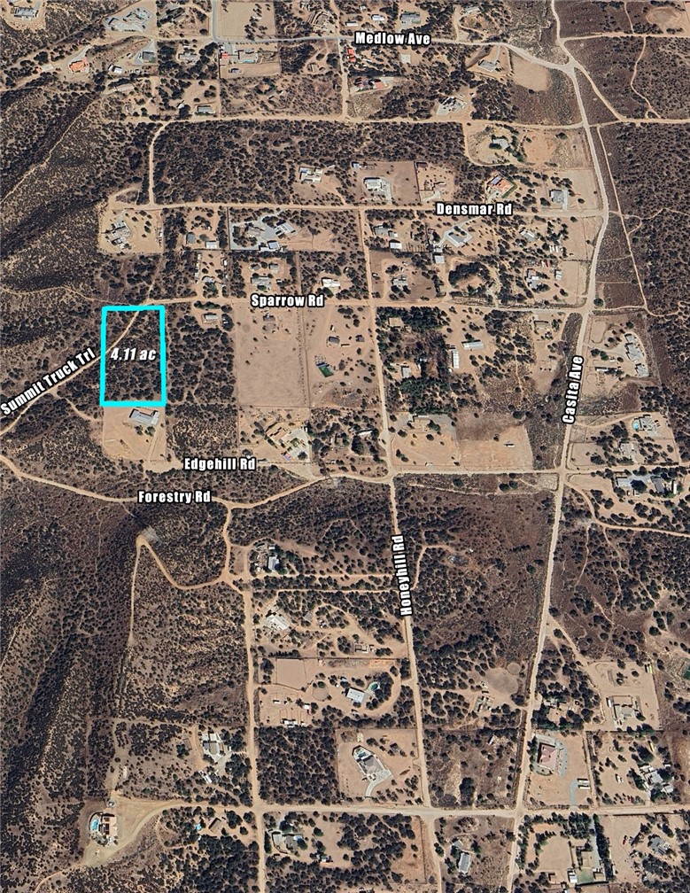 Beautiful and secluded 4.11 ac lot in South Oak Hills. Located only a mile off pavement, with a County water line on Sparrow and power adjacent. This area utilizes septic and propane. Natural extension of Summit Truck Trail traverses through northwest corner of lot but is not a recorded easement. Parcel Map shows a recorded easement along the West border of property as Verbena Rd (see Parcel Map). Existing road that traverses is located in lower elevation portion of parcel which sits between 16 and 20 feet below "top" of lot. Access is easiest via Marioposa Rd to Lantry Ln (Oak Hill or Ranchero exits). 10977 SPARROW RD OAK HILLS, CA 92344 is the address of the home next door. Multiple trails and Forest Roads lead up into the mountains within 1,000 ft of the property, providing the ability to offroad directly from your doorstep. Great opportunity to pick up a beautiful rural lot in Oak Hills.