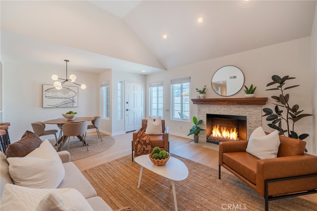 Experience the best of coastal living in the highly sought-after Foxgate community! This beautifully upgraded 2-bedroom, 2.5-bath townhome seamlessly blends comfort, style, and convenience in one of Culver City’s most desirable neighborhoods. Flooded with natural light, the open-concept layout showcases fresh paint, wide-plank LVP oak flooring, new quartz countertops, and sleek modern lighting throughout. The spacious living room features soaring vaulted ceilings, a cozy gas fireplace, a skylight, and serene treetop views - perfect for both relaxing and entertaining. Upstairs, the spacious primary suite and ensuite bathroom is a tranquil retreat, complete with vaulted ceilings and generous closet space. The recently renovated chef’s kitchen boasts quartz countertops and stainless steel appliances, ideal for those who love to cook. Step outside to your private, fenced-in patio—perfect for al fresco dining or morning coffee. Enjoy resort-style amenities just steps from your door, including a sparkling community pool and spa. Practical features include an attached two-car garage with direct access and ample built-in storage. The secure, gated complex offers peace of mind, guest parking, and a true sense of community. Located in the desirable Culver City School District, this townhome offers unbeatable proximity to everything: Playa Vista, Silicon Beach, LAX, world-class shopping, dining options, beaches, and the scenic Fox Hills Park with jogging trails, tennis, paddle tennis, and basketball courts. Don’t miss this rare opportunity to own a sophisticated townhome in a quiet, upscale enclave with all the perks of city living at your doorstep!