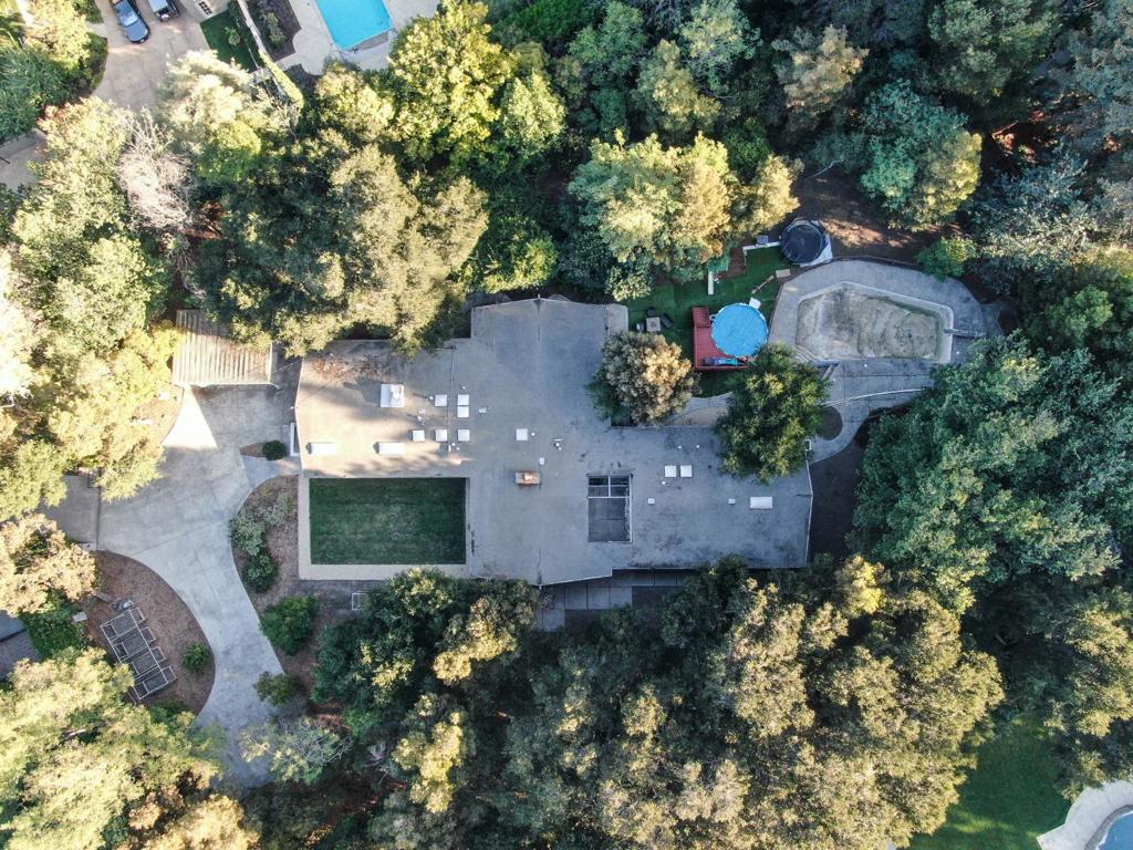 Imagine building your dream estate on this serene, flat 1.27 acre lot at the end of a coveted cul-de-sac. As you enter 76 Logan Lane, you will be greeted by magnificent grounds with gorgeous, mature trees offering the ultimate in privacy, ideally set in this sought-after location in the most exclusive zip code in the country. Just minutes to Silicon Valley tech companies, venture capital firms, Stanford University and downtown Menlo Park, a rare opportunity to make your forever home a reality.