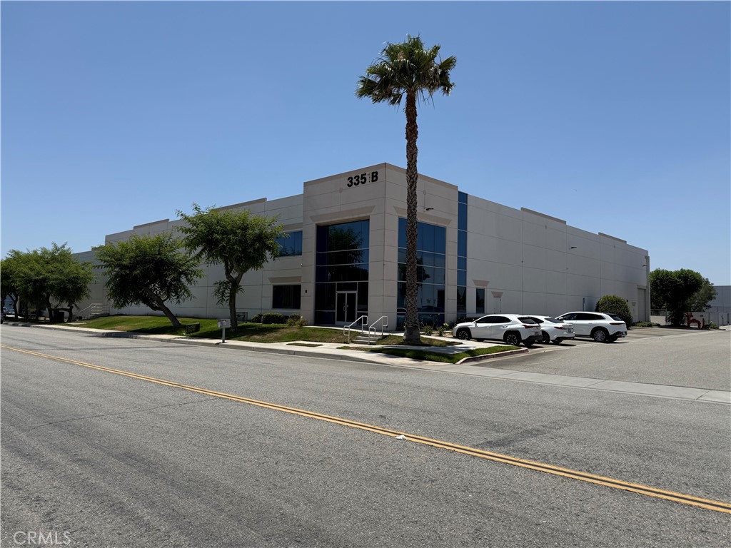 Free standing warehouse with fenced yard.