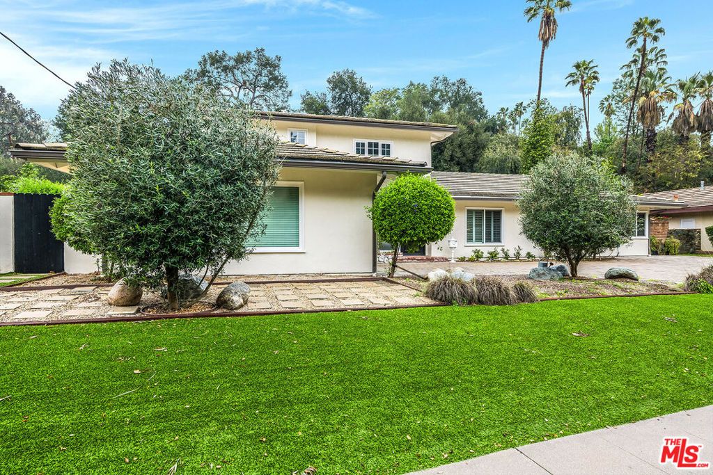 Photo of 4665 San Feliciano Drive, Woodland Hills, CA 91364 (MLS # 25631435)