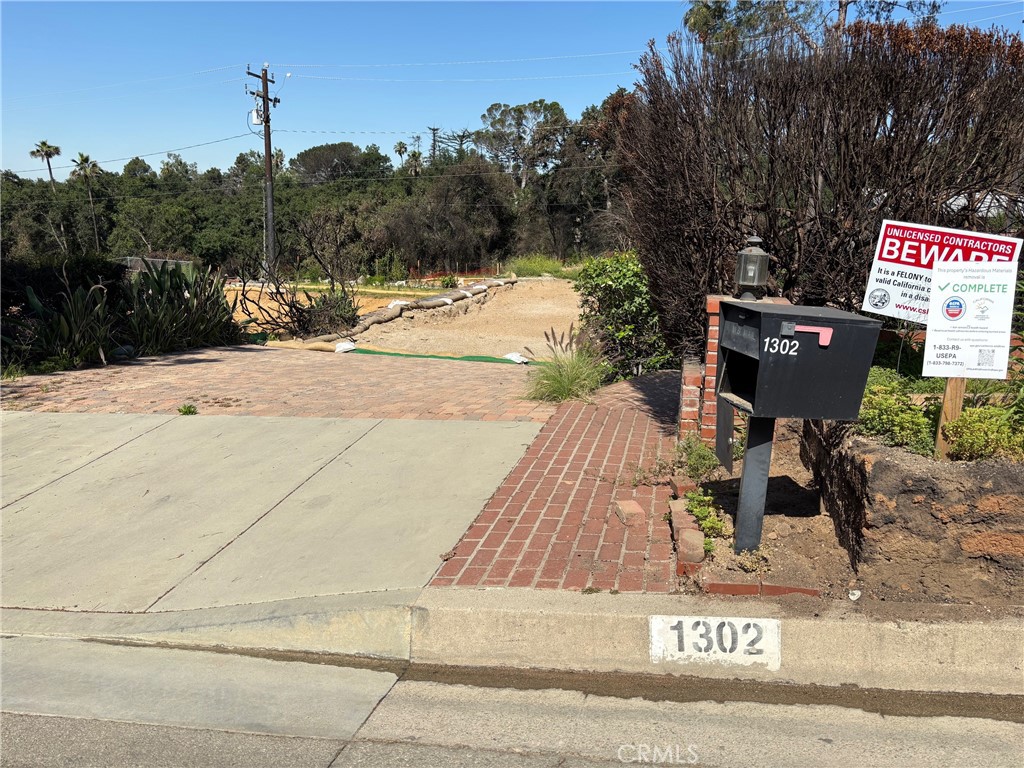 Located in the scenic foothills of the San Gabriel Mountains with nearby access to world class hiking trails, this land parcel is situated on a quiet street with no homes directly across from the property. It provides new owners with the opportunity to build their dream home with Phase 1 & 2 debris removal completed from the Eaton fire.