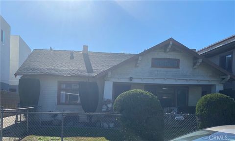 Photo of 872 W 47th St, Los Angeles, CA 90037 (MLS # RS26038778)