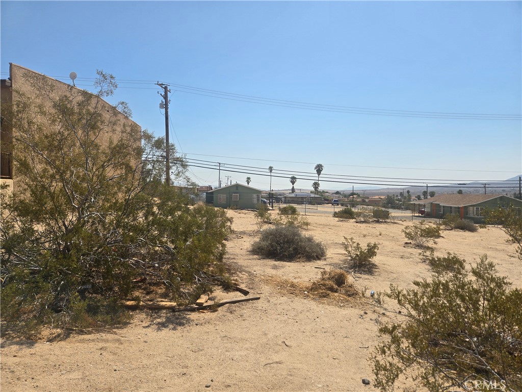 Commercial lot located at the heart of downtown Twentynine Palms. Water and electricity on the street. Seller has another lot for sale with APN 0623-091-19 and 20. This lot is zoned Commercial-General. This zone is intended to provide areas for a variety of retail, service, commercial, and professional office businesses, as well as mixed-use and multi-family residential developments. This town is going through a downtown revitalization effort thru Project Phoenix. The City of Twentynine Palms is home to the Joshua Tree National Park Headquarters and the Marine Corps Air Ground Combat Center, the world's largest Marine Corps training base. 2 minutes away from Tortoise Rock Casino.