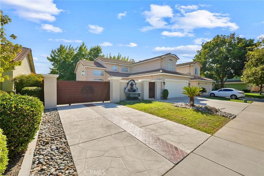 Welcome to this stunning two-story home situated in Fahrens Park, North Merced. It features four bedrooms, three bathrooms, high ceilings, a family room, a gourmet kitchen, a spacious living room, a master bedroom, crown molding throughout, a convenient courtyard, and much more. Come and fall in love with this gem.