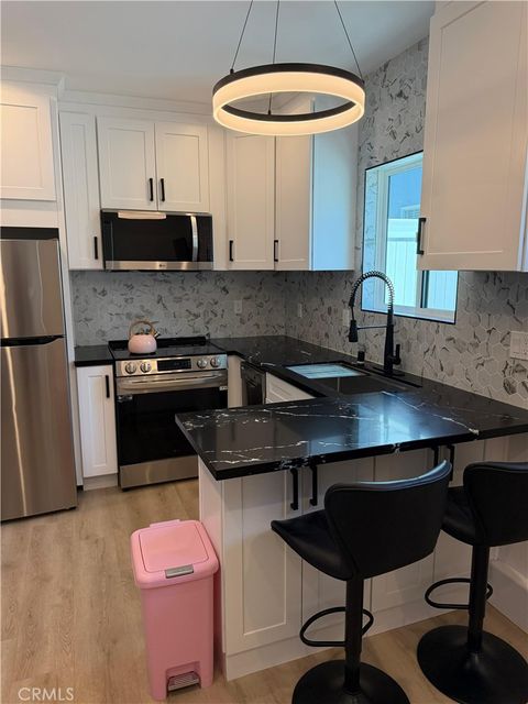 Photo of 7044 Teesdale, North Hollywood, CA 91605 (MLS # SR26102284)