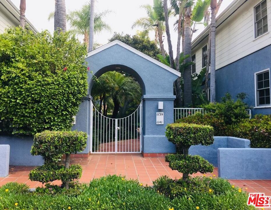 Lovely garden style living in this 2 bedroom condo in north Santa Monica. Original hardwood floors and ceramic tile in kitchen and bathroom. Has back door to kitchen and garden. One car garage. Part of a well-run HOA. Pets are limited to less than 25 lbs.