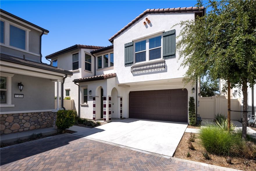 Step into a dream home that blends modern luxury with the warmth of neighborhood charm, located in the heart of The Groves. This expansive property, perfectly positioned in a quiet cul-de-sac, offers five spacious bedrooms and four full bathrooms. As you walk through the door, you're welcomed by an open-concept floor plan that floods the space with natural light, highlighting the airy and inviting atmosphere.



The custom chef’s kitchen, designed with both style and function in mind, features a large island with seating, quartz countertops, stainless steel appliances, including a luxury GE Cafe refrigerator, and abundant storage, making it perfect for both everyday living and entertaining. The adjacent dining room, with its oversized glass doors, seamlessly connects to the backyard—an ideal setting for summer barbecues and cozy evenings under the beautiful cafe lights.



On the first floor, you'll find a guest bedroom with a full bathroom. Upstairs, the home continues to impress with three additional bedrooms, including another guest en-suite with its own private bathroom. The oversized master suite is a true retreat, complete with a luxurious en-suite bathroom that includes a separate shower, soaking tub, dual sinks, and a walk-in closet. The upper level also features a fourth full bathroom with dual sinks and a bathtub, along with a dedicated laundry room equipped with full-sized, side-by-side washer and dryer hookups and ample storage space.



The property includes a large two-car garage, outfitted with two level 2, 220v outlets for EV charging and additional driveway parking, ensuring plenty of space for vehicles and additional storage. Beyond the home itself, The Groves community offers unmatched amenities: two pools (one with a shallow beach entry), a hot tub, playground, a gym, meeting rooms, co-working spaces, gathering areas, a bocce ball court, a putting green, and a dog park. Plus, you're immediately within proximity to multiple grocery stores, gym, and some of the best retail and dining options around. This home truly has everything you need and more.