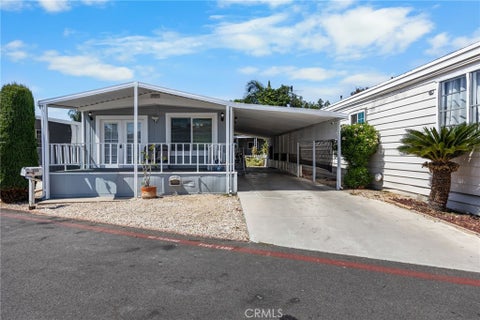 Photo of 122 S Portola LN, Tustin, CA 92780 (MLS # PW26201799)