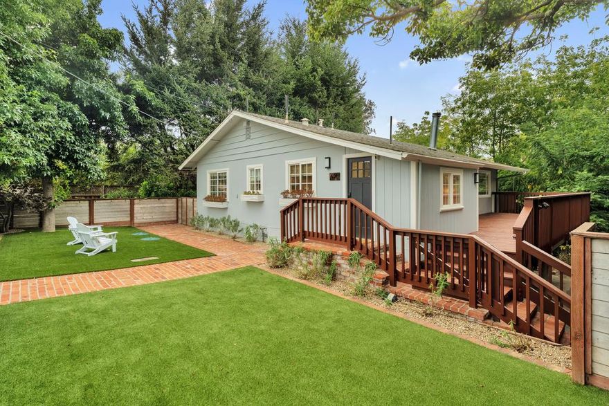 Located in the heart of Corralitos, this home is move-in ready with the updates that truly matter. The remodeled kitchen with stunning custom finishes is suitable for the chef with uncompromising standards & provides a special space for hosting lively gatherings with family & friends. New floors flow throughout & the primary bathroom has been fully renovated providing for a spa-like experience, complete with a built-in towel warmer. Curl up by the living room fireplace on a cool morning or open up the french doors & relax on the expansive private deck on a sunny afternoon. Both the front & back yards are low maintenance & fenced, adding privacy & security for the little ones & four-legged friends. Exceptional storage sets this property apart - you'll rarely find a home of this size with so much space at your fingertips. Downstairs, a versatile bonus area with a half bath offers flexibility for a home office, creative studio, or guest room. Plug in your EV charger & enjoy close proximity to local favorites including the Corralitos market & brewery, Aldridge Park for plenty of play, nearby wineries, plus endless hiking & biking trails make every outing full of enjoyable possibilities. Everyday feels fuller in a home where comfort, character, & great moments naturally come together.