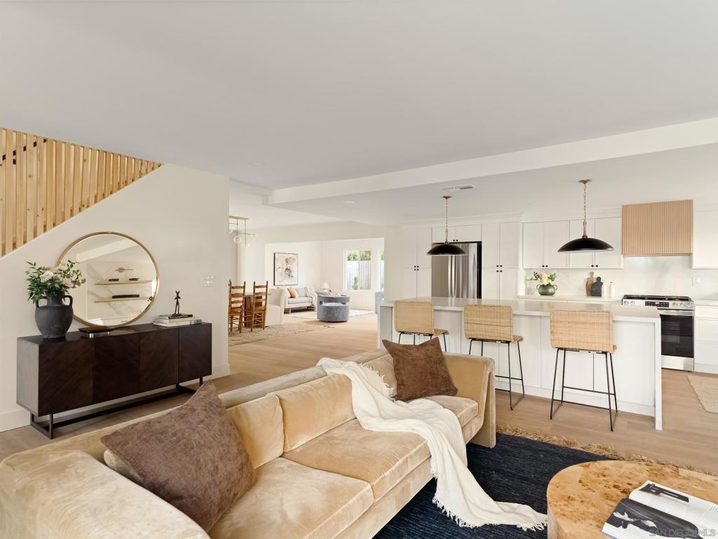 Welcome to this stunning, fully renovated home that blends modern upgrades with timeless design on a large, useable cul-de-sac lot. Inside you’ll find an open floor plan with new LVP flooring, fresh paint/texture, all new dual pane windows, and a beautifully redesigned fireplace. The chef’s kitchen features slim white shaker cabinetry, a white oak waterfall island, quartz counters, stainless steel appliances, and a microwave drawer. The primary suite offers a spa-like bath with dual vanity and tiled walk-in shower. Includes a permitted private-entry multigenerational ADU suite with kitchenette, bath, AC—perfect for guests, extended family, or rental income. Exterior upgrades include all new landscaping with sod, planters, mulch, automatic sprinklers/drip system, garage door, and full exterior paint. Newer roof with warranty, paid-in-full solar, and two Tesla Back up Batteries. Full sized indoor laundry room with storage, mirrored closet doors, recessed lighting and new GFCI’s throughout. This home has been fully reimagined for modern living and is 100% move-in ready. Welcome to this stunning, fully renovated home that blends modern upgrades with timeless design on a large, useable cul-de-sac lot. Inside you’ll find an open floor plan with new LVP flooring, fresh paint/texture, all new dual pane windows, and a beautifully redesigned fireplace. The chef’s kitchen features slim white shaker cabinetry, a white oak waterfall island, quartz counters, stainless steel appliances, and a microwave drawer. The primary suite offers a spa-like bath with dual vanity and tiled walk-in shower. Includes a permitted private-entry multigenerational ADU suite with kitchenette, bath, AC—perfect for guests, extended family, or rental income. Exterior upgrades include all new landscaping with sod, planters, mulch, automatic sprinklers/drip system, garage door, and full exterior paint. Newer roof with warranty, paid-in-full solar, and two Tesla Back up Batteries. Full sized indoor laundry room with storage, mirrored closet doors, recessed lighting and new GFCI’s throughout. This home has been fully reimagined for modern living and is 100% move-in ready.