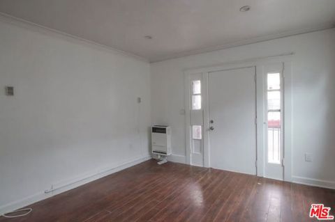 Photo of 1056 W 42nd Place, Los Angeles, CA 90037 (MLS # 26647443)