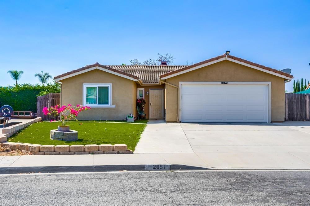 Beautifully updated single-story on the largest lot in the neighborhood—over 10,000 sq ft—at the end of a quiet cul-de-sac with mountain views. This 3 bed, 2 bath, 1,396 sq ft home features a recently remodeled kitchen, laminate flooring, fresh paint. Enjoy central heat & air, leased solar, and RV parking. Spacious backyard perfect for entertaining. No HOA or Mello-Roos. Conveniently located near Heritage K-8 Charter School, Escondido Charter High School, and Quantum Academy. Minutes to Felicita County Park, El Norte Park, and Kit Carson Park. Close to Escondido Village Shopping Center, Westfield North County, and Downtown Grand Avenue boutiques. Grocery shopping made easy with Albertsons, ALDI, and Vons all nearby, plus quick freeway access for an easy commute.