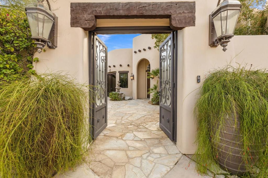 Photo of 49240 Jfk Trail, Palm Desert, CA 92260 (MLS # 219141213DA)