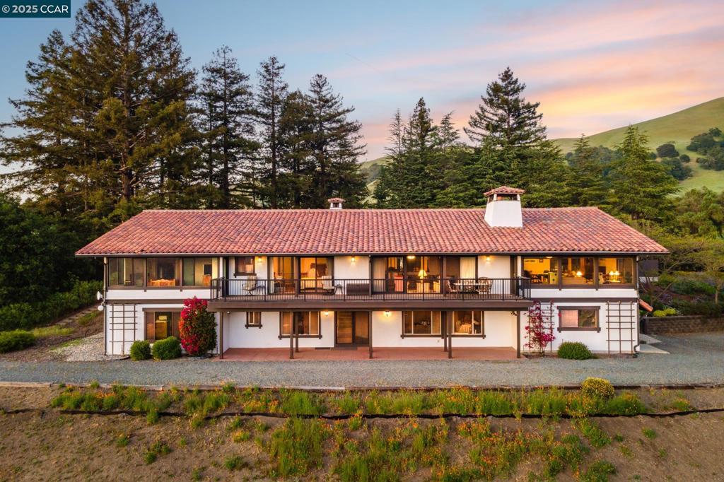 Rare 19.81-Acre Estate with Endless Possibilities in Moraga Welcome to 110 Valley Hill Drive—an extraordinary opportunity to own nearly 20 acres of private, picturesque land in one of the most scenic corners of Moraga. Surrounded by regional park and preserved open space. This 3,092± sq ft ranch-style home offers panoramic views, peaceful surroundings, and incredible potential to create your dream retreat.The home features a spacious and functional layout with formal living and dining room a large family room, and a classic kitchen with eat-in area. Walls of windows invite natural light and frame the serene landscape. Easily add 1600 more square feet by finishing off the lower level.Step outside and take in the possibilities—expand the home, build a pool, barn, guest house, or simply enjoy the wide-open space. The land is ideal for equestrian use, vineyard potential, or multi-generational living. Located just minutes from top-rated Moraga schools, St. Mary’s College, and charming downtown amenities, yet offering the seclusion of a true country estate surrounded by regional park and preserved land. Rarely does a property of this size, location, and versatility become available in Lamorinda.