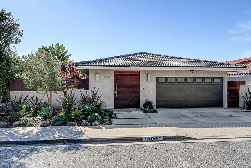 Positioned mid block on the private section of Marine Avenue behind the hedges, this large single level 3 bed PLUS Office/2.5 bathroom home recently underwent a complete renovation with top of the line finishes. Open up the secured entry gate and you're greeted with a stunning patio including serene landscaping and a koi pond that leads you to the front door. Ideal floorplan perfect for entertaining with two separate living areas, vaulted ceilings, a dining room, separate powder room, and open concept great room that flows out to the private backyard with a large slider. Huge kitchen with tons of storage featuring built in Thermador appliances make this a chef's dream. The two guest bedrooms are both extra large and have tons of closet space. The primary suite features a walk in closet, dual sinks, and a tub with jets. The private backyard offers a peaceful retreat with beautiful mature landscaping and a built in outdoor kitchen. Additional features include central air conditioning, bonus storage in the garage attic with a dropdown ladder, finished off garage with A/C, built in security system and cameras, and the entire home is wired for high speed internet throughout. Other items included in the lease are a washer/dryer and extra fridge and freezer in the garage. Great location within a short walk to shopping, parks, and award winning Manhattan Beach schools.