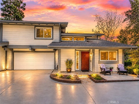 Photo of 7300 E Singingwood Dr, Anaheim Hills, CA 92808 (MLS # PW26165599)