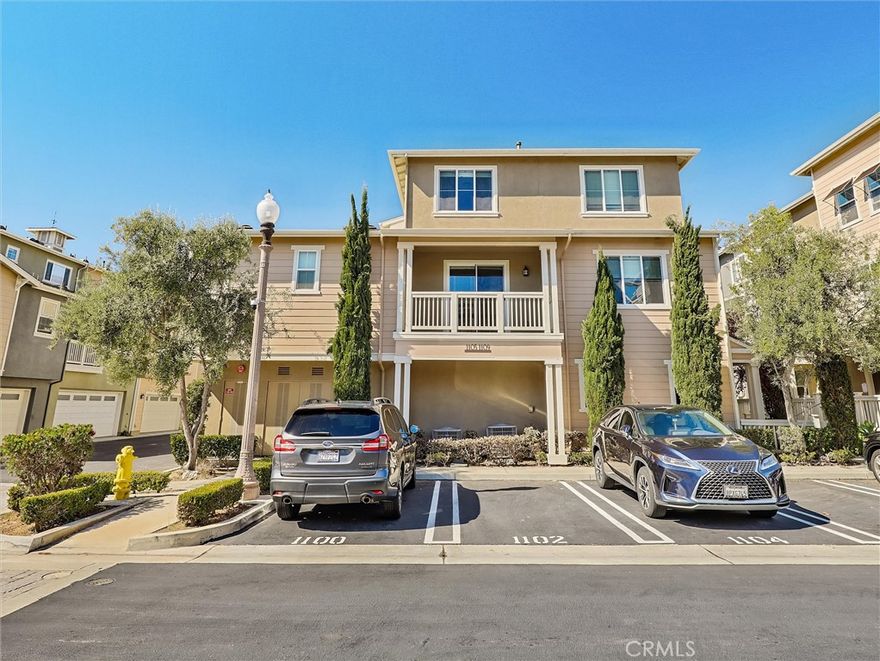 Built in 2011, this 2,270 sq.ft. end unit features 3 bedrooms plus a den and 3.5 bathrooms. The entry level offers a den with a full bath, laundry room, and direct access to a 2-car garage. The second level includes a spacious living room with a fireplace, modern kitchen with island, Caesarstone countertops, stainless steel appliances, and a walk-in pantry, plus a balcony and powder room. The primary suite has a walk-in closet, soaking tub, separate shower, and dual sinks. Two additional bedrooms and a full bath are on the third level. Hardwood floors, carpeted bedrooms, tankless water heater, central A/C, and fresh paint throughout. Refrigerator and dryer included (without warranty). Great location near Wilson Park and Farmer’s Market with guest parking next to the unit.