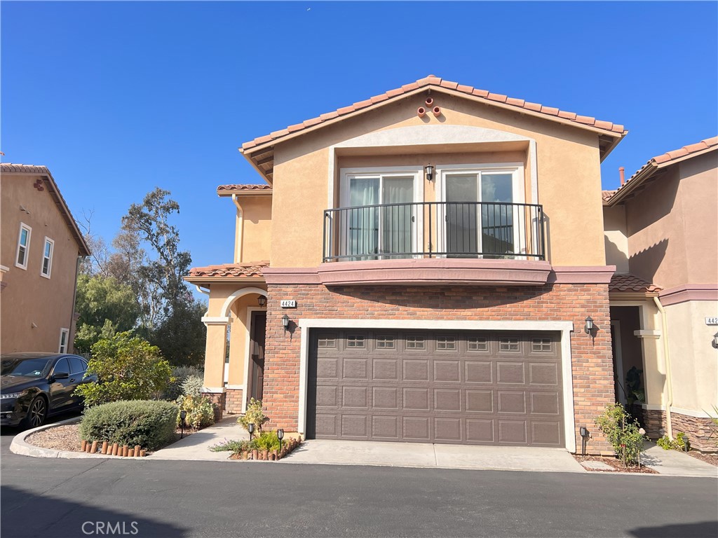 Beautiful townhome with mountain view in the highly sought-after Lago Los Serranos Community. This contemporary residence features a spacious and open floor plan, Brand new vinyl flooring throughout the first floor. Exterior windows and doors are solid built with Aluminum alloy anti-theft security. Grand doors open to the backyard with sliding doors along with the expansive dramatic mountain and golf views. The kitchen features solid cabinets, chef’s pantry, and top-tier stainless steel appliances. Upstairs you’ll find the primary suite with walk-in closets, walk-in rain shower. A private retreat loft hosts an executive office with custom intelligent system is ideal for working at home. Luxury community amenities such as swimming pools, clubhouse, parks, tennis courts, basketball courts and more. Conveniently located just minutes from Los Serranos Lake and Los Serranos Country Club, elementary school plus shopping centers. No Mello-Roos! High-Rated Award-Winning Schools