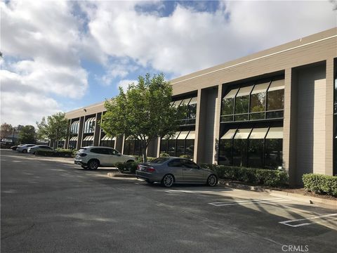 Photo of 23232 Peralta Drive #117, Laguna Hills, CA 92653 (MLS # EV23224231)