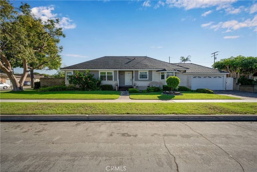 This beautiful remodeled South of Conant large corner lot home has great curb appeal with smooth cats eye stucco, cement board siding, paver walkway , front porch and driveway. Formal living room & dining area with lots of natural light. Updated open kitchen with Corian counter tops, Built-in appliances, lots of cabinet space with pullout drawers & bar top counter. Family room with fireplace, dining area & back yard and garage access. Large master bedroom with remodeled 3/4 bath with tiled vanity, shower & floor. 2 bedrooms with nice size closets with mirrored sliders. Engineered hardwood floors throughout. Private lush back yard with large patio area, separate side yard with possible boat or RV parking & block fence. 2 car attached garage with opener & direct house access, laundry hookups (Gas or 220). Central heating & a/c. Double pane windows & slider. Copper plumbing. All cast iron drain lines replace to main sewer line with High-Density Polyethylene plastic pipe.