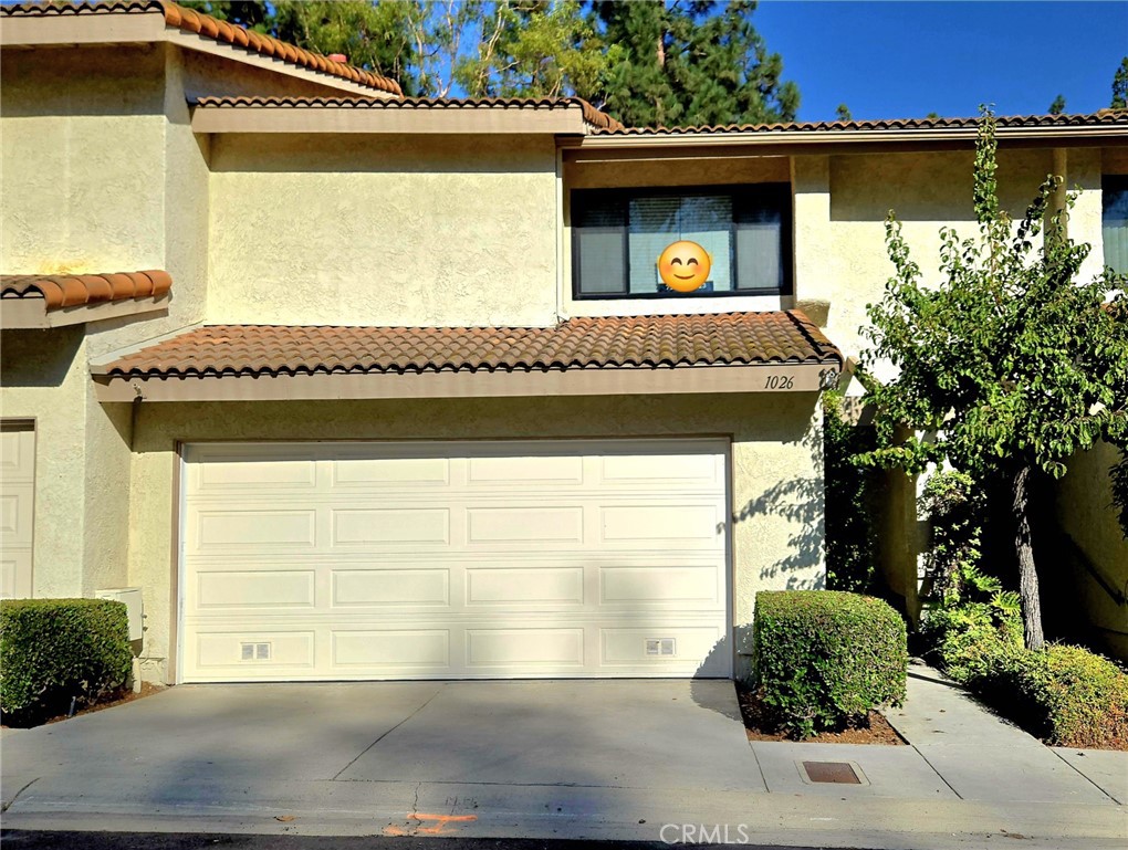 Popular Malvern Creek condo in a great location. This unit offers recently remodeled kitchen including new cabinets, new quartz counter tops and new appliances. All bathrooms are remodeled with new vanities, new bath tub, and new shower. Of course all new hardwares and light fixtures in all bathrooms and kitchen. Scraped ceilings with new recessed lights and new ceiling fans. Cozy fireplace in living room, cathedral ceilings, and laminate floorings throughout. Central air and direct access to 2 car attached garage with epoxy finishing floor. Huge walk-in closet in master bedroom. Spacious patio with beautiful hardscaping and solar lights overlooking community common area. Very well maintained community just across from Amerige Heights shopping center. Fisler school for K-8th grade and Sunny Hillils High area.