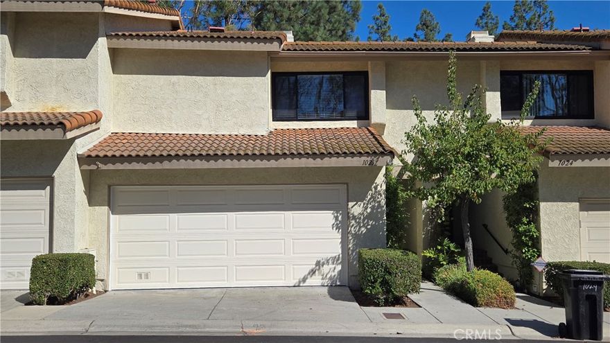 Popular Malvern Creek condo in a great location. This unit offers recently remodeled kitchen including new cabinets, new quartz counter tops and new appliances.  All bathrooms are remodeled with new vanities, new bath tub, and new shower. Of course all new hardwares and light fixtures in all bathrooms and kitchen. Scraped ceilings with new recessed lights and new ceiling fans.  Cozy fireplace in living room, cathedral ceilings, and laminate floorings throughout.  Central air and direct access to 2 car attached garage with epoxy finishing floor.  Huge walk-in closet in master bedroom. Spacious patio with beautiful hardscaping and solar lights overlooking community common area.  Very well maintained community just across from Amerige Heights shopping center.  Fisler school for K-8th grade and Sunny Hillils High area.  READY TO MOVE IN!!!