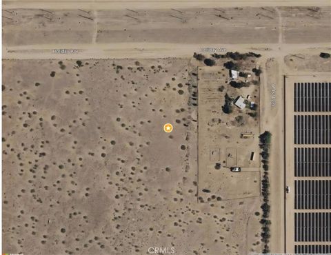 Photo of 0 Holiday Avenue, Rosamond, CA 93560 (MLS # DW26066915)